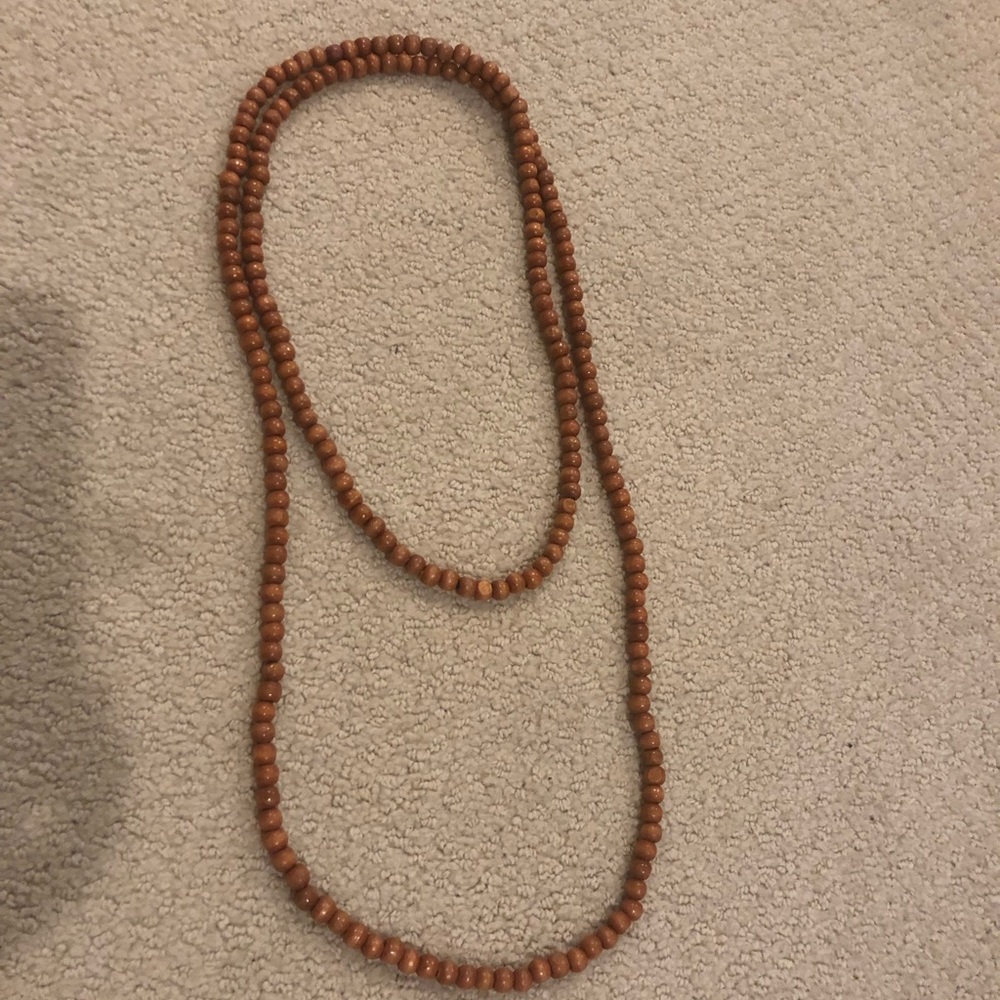 Beaded by W long brown necklace!